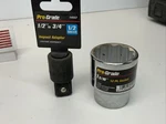 Pro-grade 1/2 (f) To 3/4(M) Adapter And 12PT Socket, 1-5/16", Taiwan. Fixed Price $12.50.